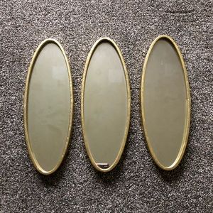 Set of three oval mirrors